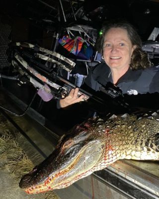 Sue put the smack down on this gator with one shot to the br...